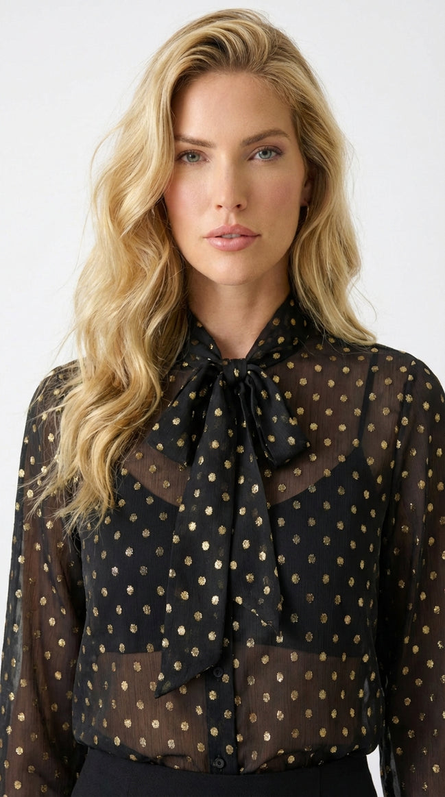 Chemisier à manches longues avec col lavallière à nouer.