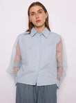 Chemisier bleu manches transparentes