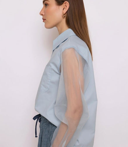 Chemisier bleu manches transparentes